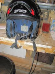 Nolan helmet fitted with boom and speakers