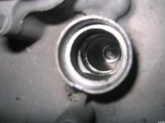 Clean cylinder #1 spark plug well