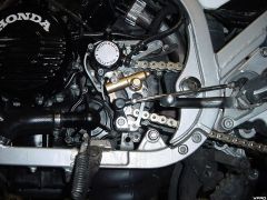 Speedo pickup/clutch release bracket