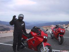 Me waving at the top of Mt Evans
