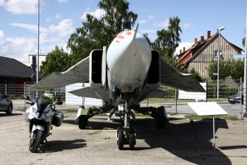 Posing at aircraft museum Wernigerode (Germany) with a Mig23