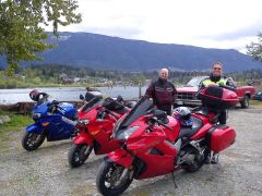 Cooling off the bikes at Cowichan Lake boat launch and trying to keep the eyes off the wildlife getting changed on the dock.