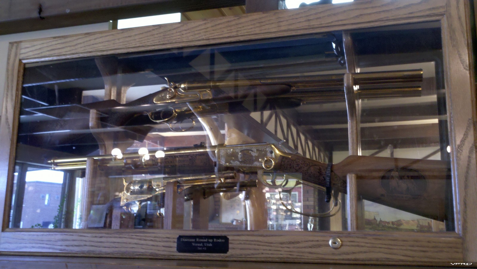 Custom hand engraved guns on display