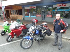 Old timer touring on 225cc Yamaha