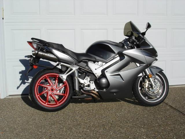 black motorcycle red wheels