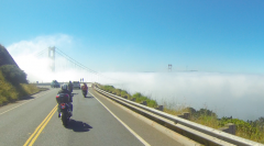 More information about "Golden Gate Bridge peaks above the fog."
